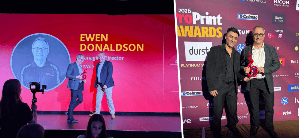 Ewen Donaldson speaks at an event, and a man accepts a ProPrint award onstage.